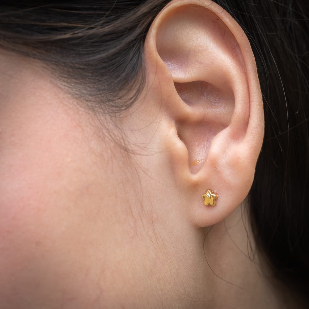 Aretes florcita con diamante